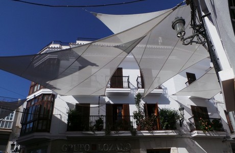 Velas triangulares Sevilla